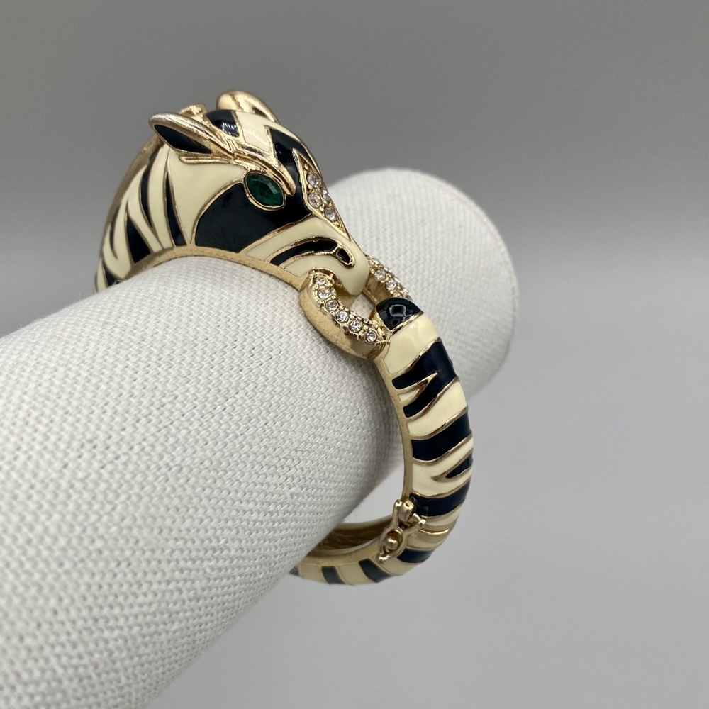 Hinged Zebra Enamel Bracelet With Clear Rhinestonsand Green Rhinestone Eyes